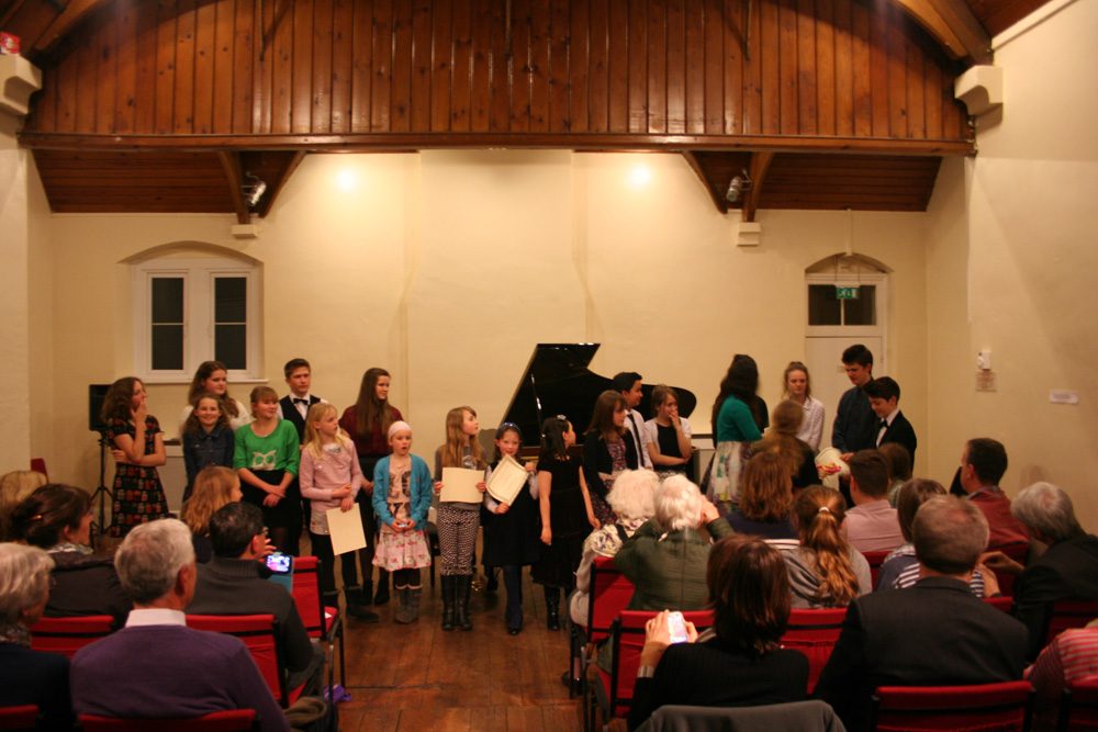 Certificates being awarded at the Spring Recital